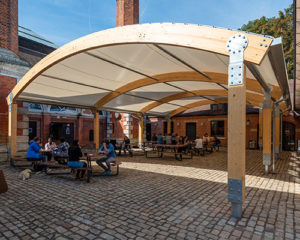 New Case Study: Leading University selects Glulam dining canopy for heritage setting